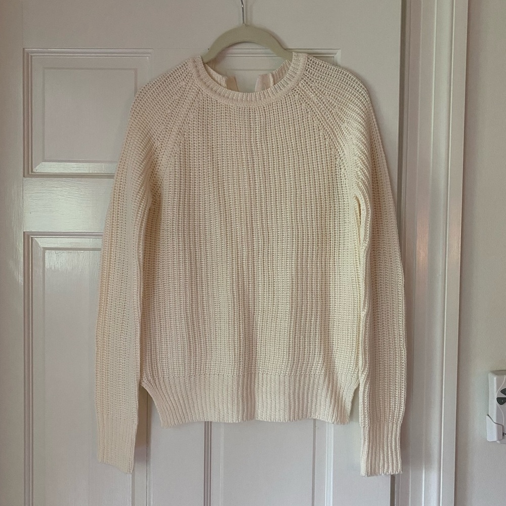 Knit button down entire back.  Worn once